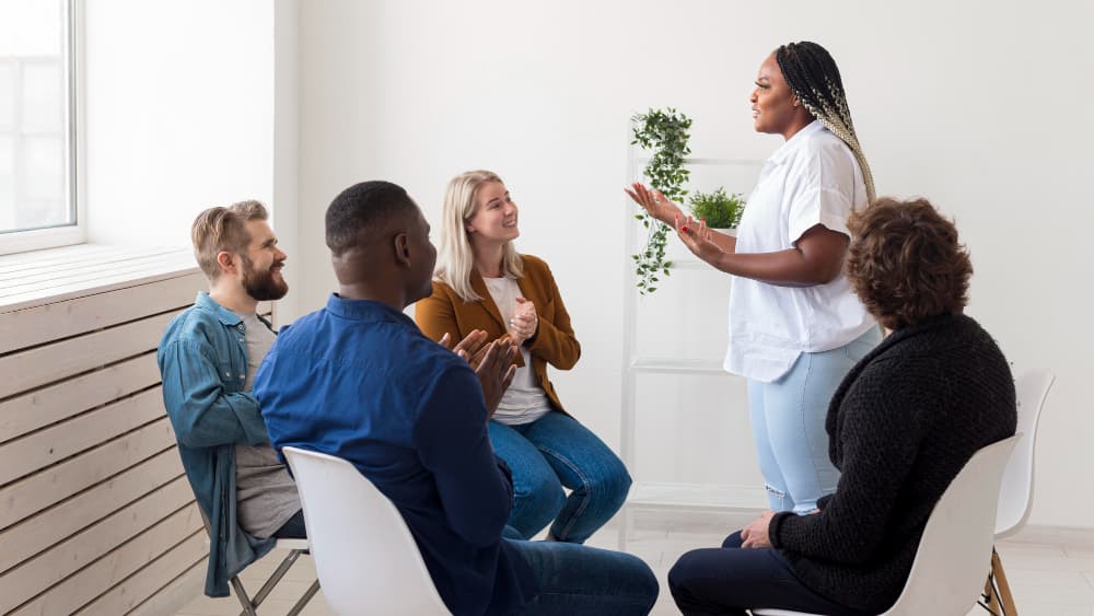 Woman Speaking to Group
